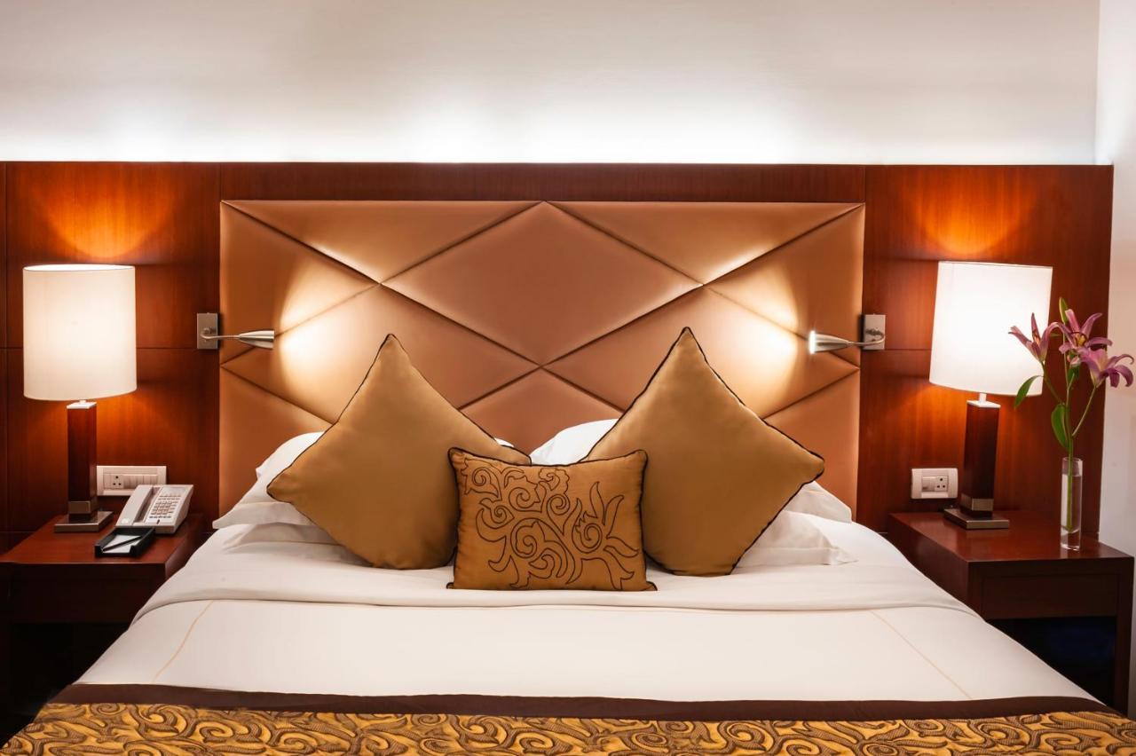 Taj Chandīgarh מראה חיצוני תמונה A bedroom at the Taj Bengal